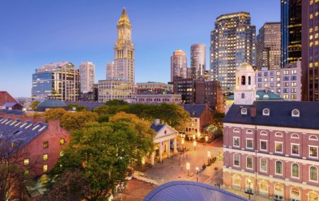 Night time sky with an ariel view of historic brick buildings in Boston